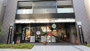 A hotel entrance with a sign reading "HOTEL MAX". - Hotel Livemax Osaka Yodoyabashi (Osaka)