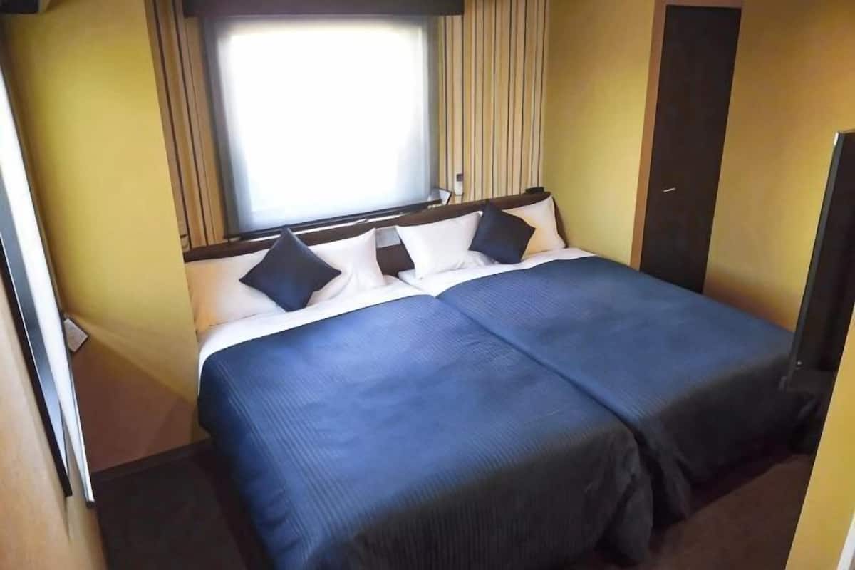 Desk, blackout curtains, free WiFi, bed sheets