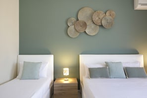 3 habitaciones, caja de seguridad en la habitación y escritorio