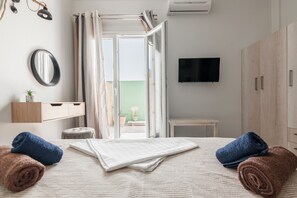 1 dormitori, planxa i posts de planxar, wifi gratuïta i roba de llit 