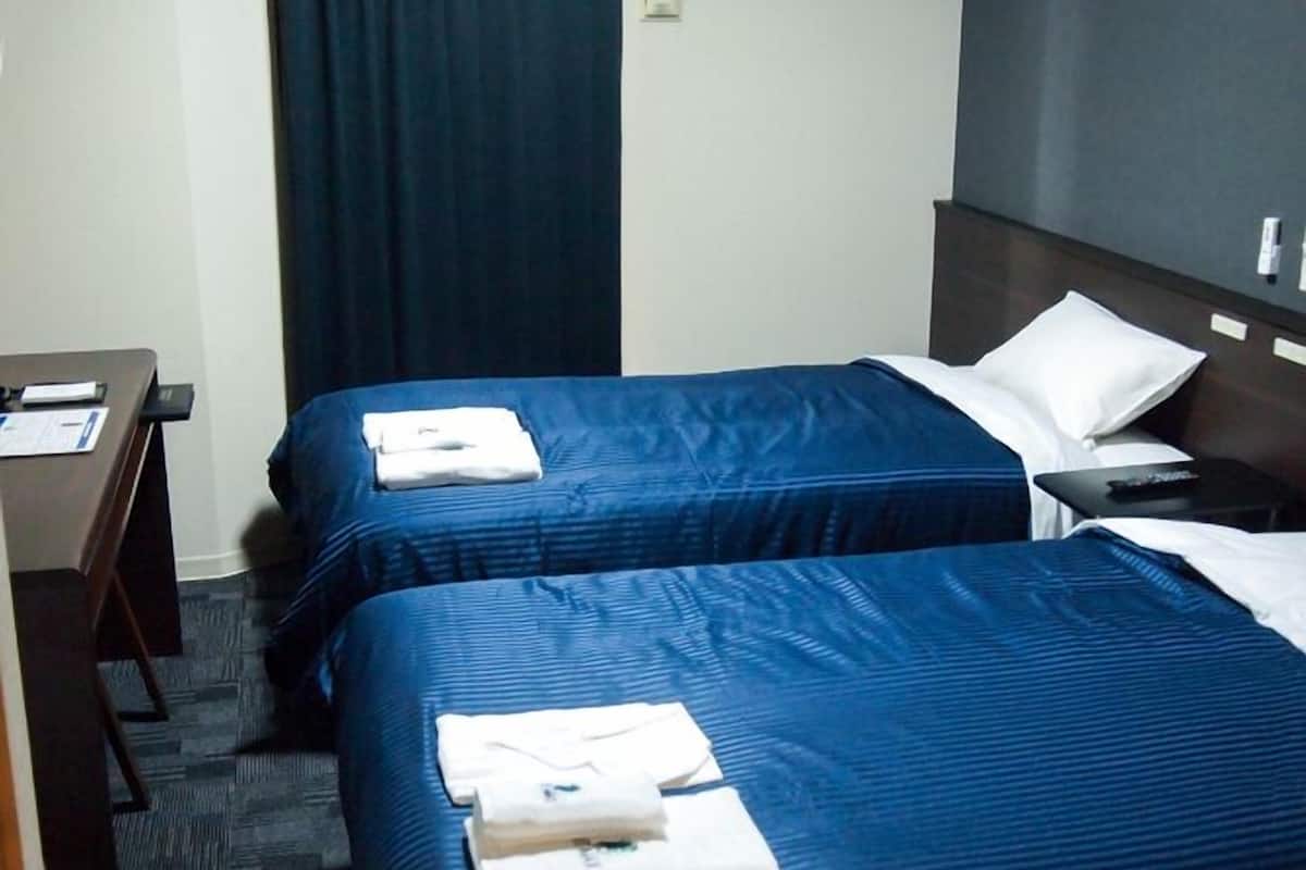 Desk, laptop workspace, free WiFi, bed sheets