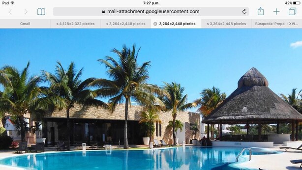 A clear blue pool with lounge chairs and palm trees, surrounded by buildings with thatched roofs. - Yikal house. Beautiful house 4 rooms (10 pers), 4 tennis court pools. (38)