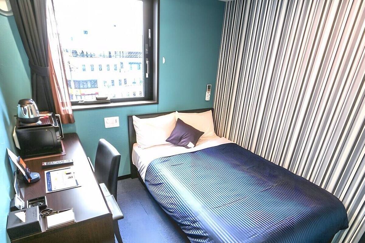 Desk, iron/ironing board (on request), WiFi (free)