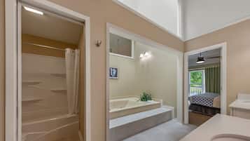 Combined shower/tub, hair dryer, towels, soap