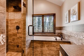 Bathtub, hair dryer, towels
