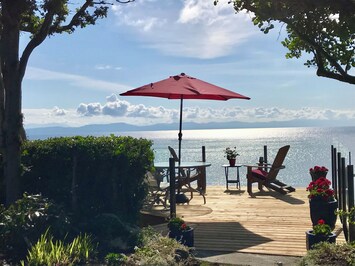 Watch the eagles soar from this front deck overlooking a secluded sandy beach. 
