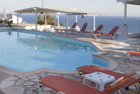Outdoor pool, pool loungers