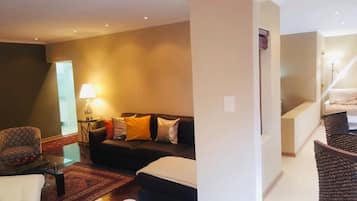 Penthouse, 3 Bedrooms, Sea View | Living room | 65-inch Smart TV with satellite channels, TV, fireplace