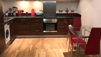 Luxury Apartment | Private kitchen | Fridge, microwave, oven, stovetop