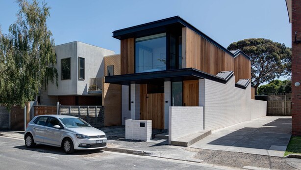 A modern two-story house with a car parked in the driveway. - Woodfin House Pet Friendly Home in Abbotsford (Abbotsford)