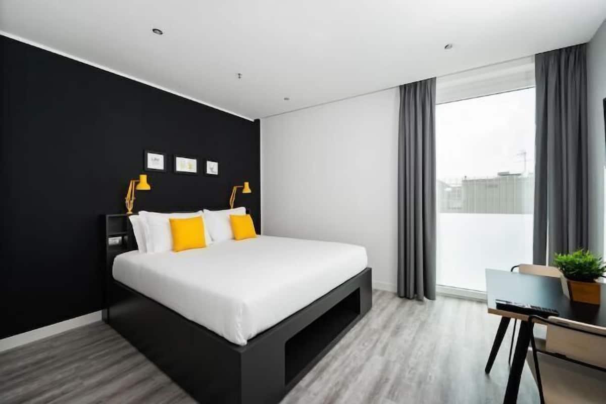 In-room safe, desk, laptop workspace, blackout curtains