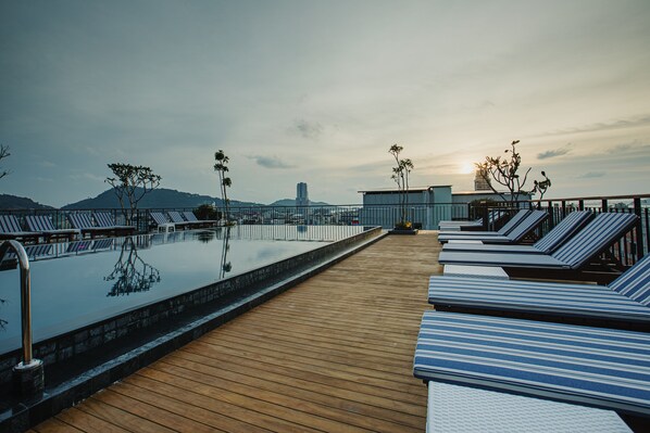 Outdoor pool, open 8:00 AM to 11:00 PM, pool umbrellas, pool loungers - Rak Elegant Hotel Patong (Patong)
