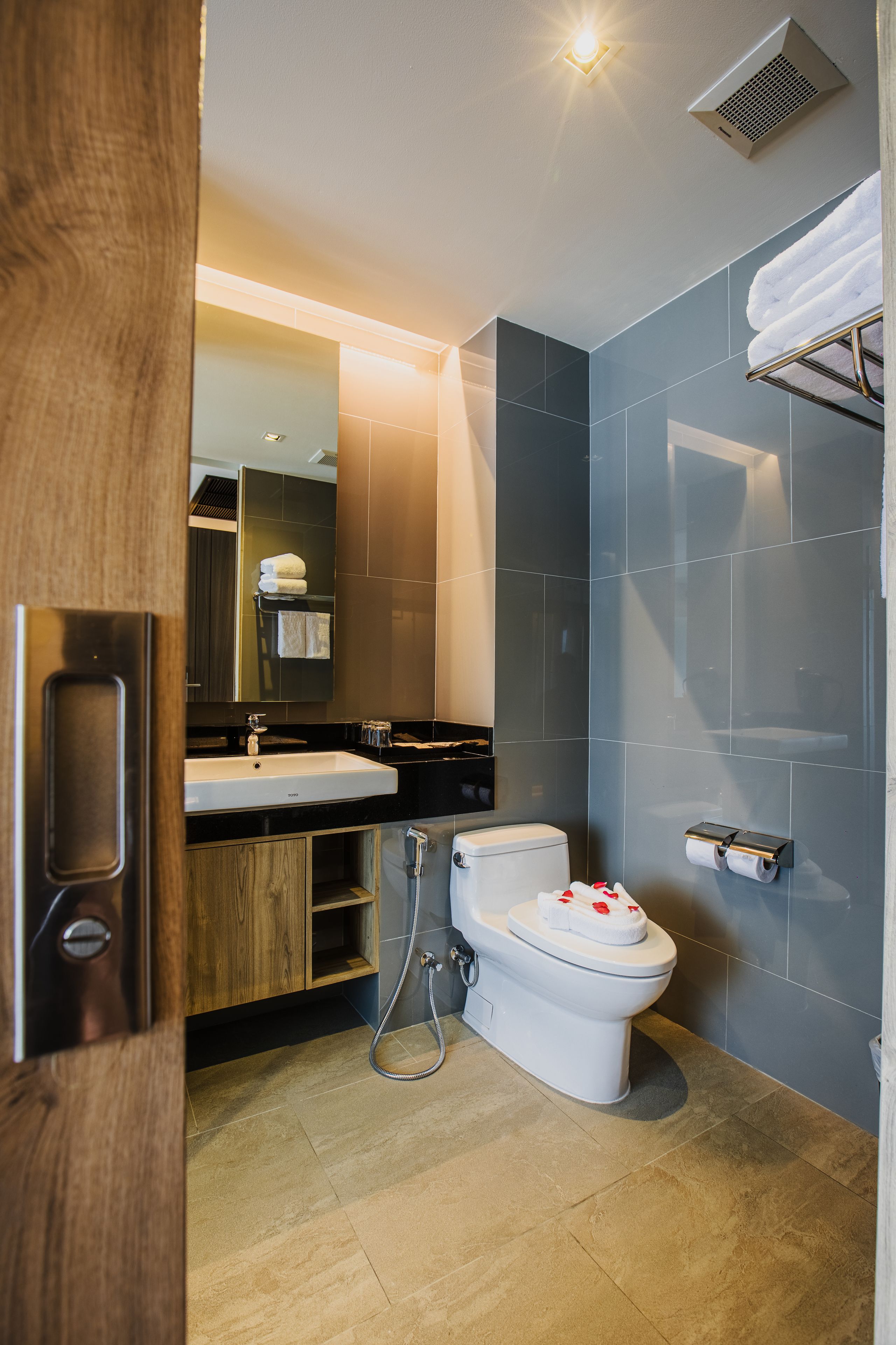 shower, rainfall showerhead, designer toiletries, hair dryer