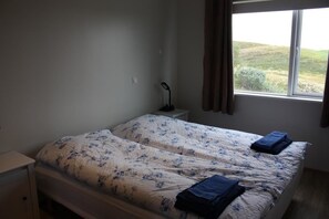 Twin Room, Shared Bathroom | Blackout drapes, free cribs/infant beds, free WiFi, bed sheets