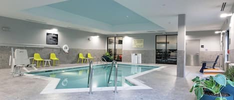 Indoor pool, open 6:00 AM to 11:00 PM, pool loungers