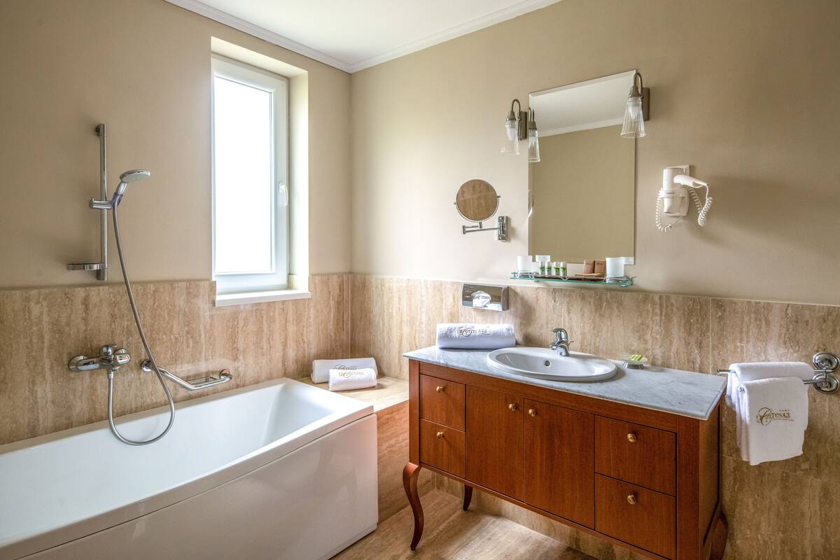 Shower, hair dryer, bathrobes, towels