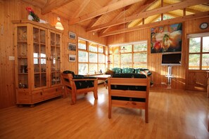 Cottage, 4 Bedrooms | Living area | Flat-screen TV