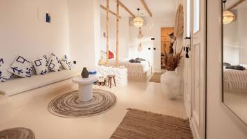 Deluxe Suite, Garden View | 1 bedroom, premium bedding, free minibar, iron/ironing board