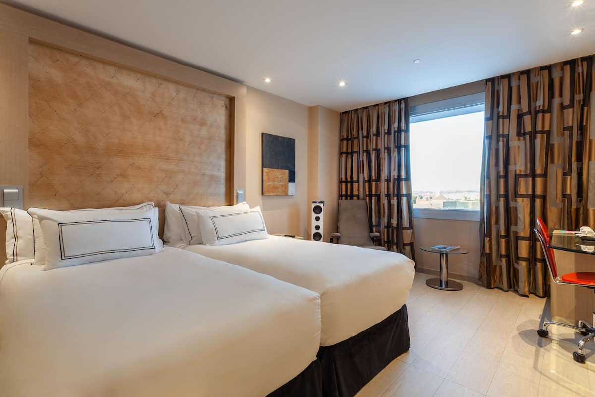 twin room (melia) | 1 bedroom, down duvets, minibar, in-room safe