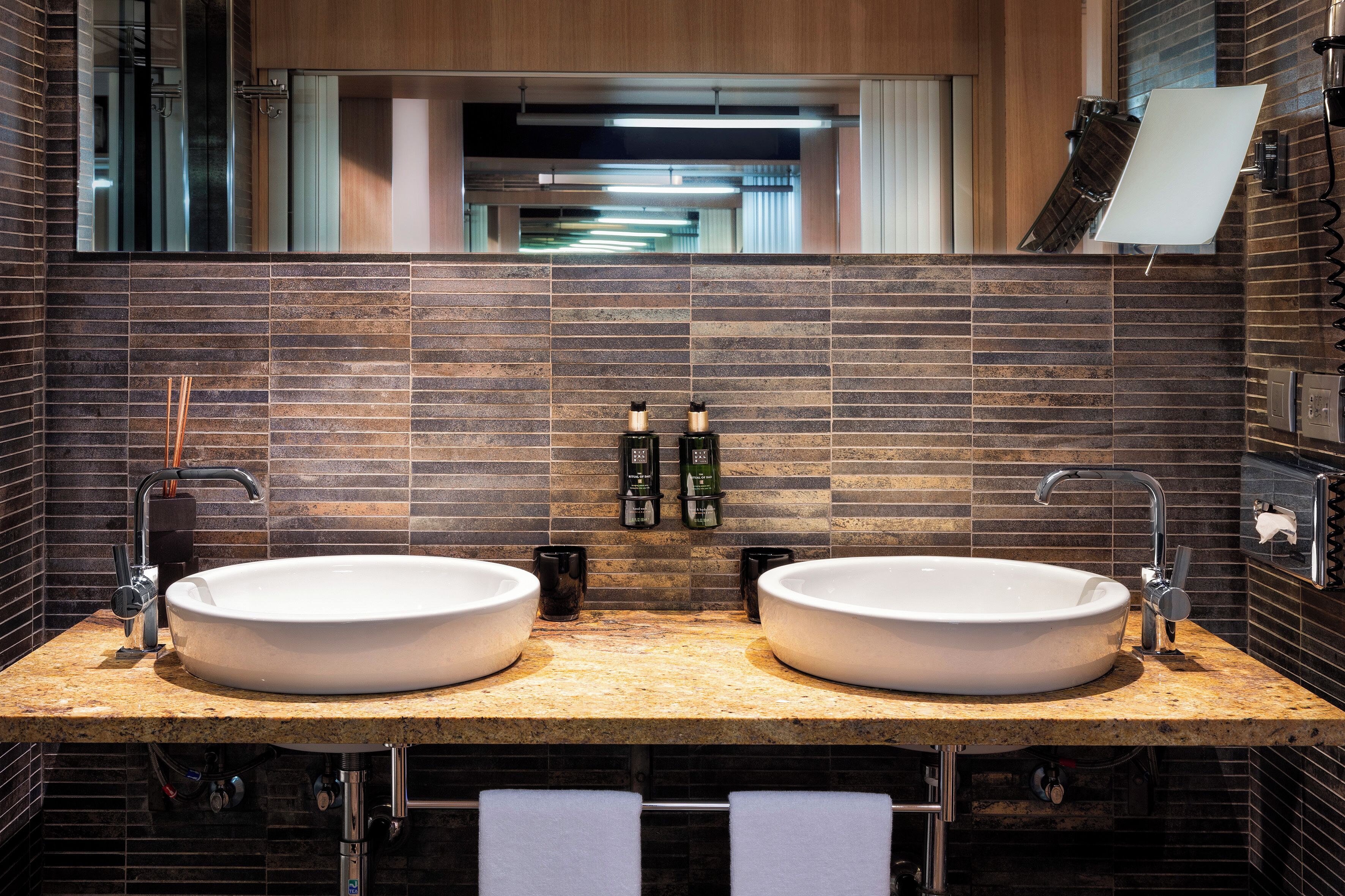 room (melia the level) | bathroom | rainfall showerhead, free toiletries, hair dryer, towels