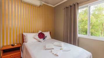 Quarto casal ou duplo premium | Frigobar, cortinas blackout, Wi-Fi de cortesia, roupa de cama