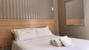 Quarto superluxo | Frigobar, cortinas blackout, Wi-Fi de cortesia, roupa de cama