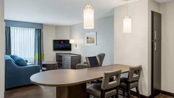 Suite, 1 Bedroom | Living area | 55-inch flat-screen TV with cable channels, TV
