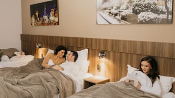 Deluxe Quadruple Room, Multiple Beds, Non Smoking | 1 bedroom, hypo-allergenic bedding, in-room safe, blackout drapes
