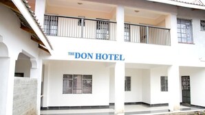 A building with the sign "The Don Hotel" indicating it is a hotel.