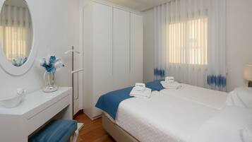 Appartement, 1 chambre, rez-de-chaussée | 1 chambre, fer et planche à repasser, lits bébé (en supplément)