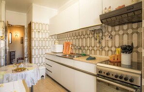 Apartment, 2 Bedrooms | Private kitchen | Fridge, microwave, oven, stovetop