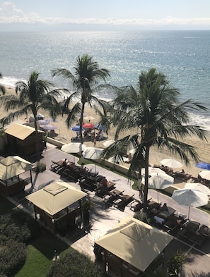 On the beach, sun-loungers, beach towels