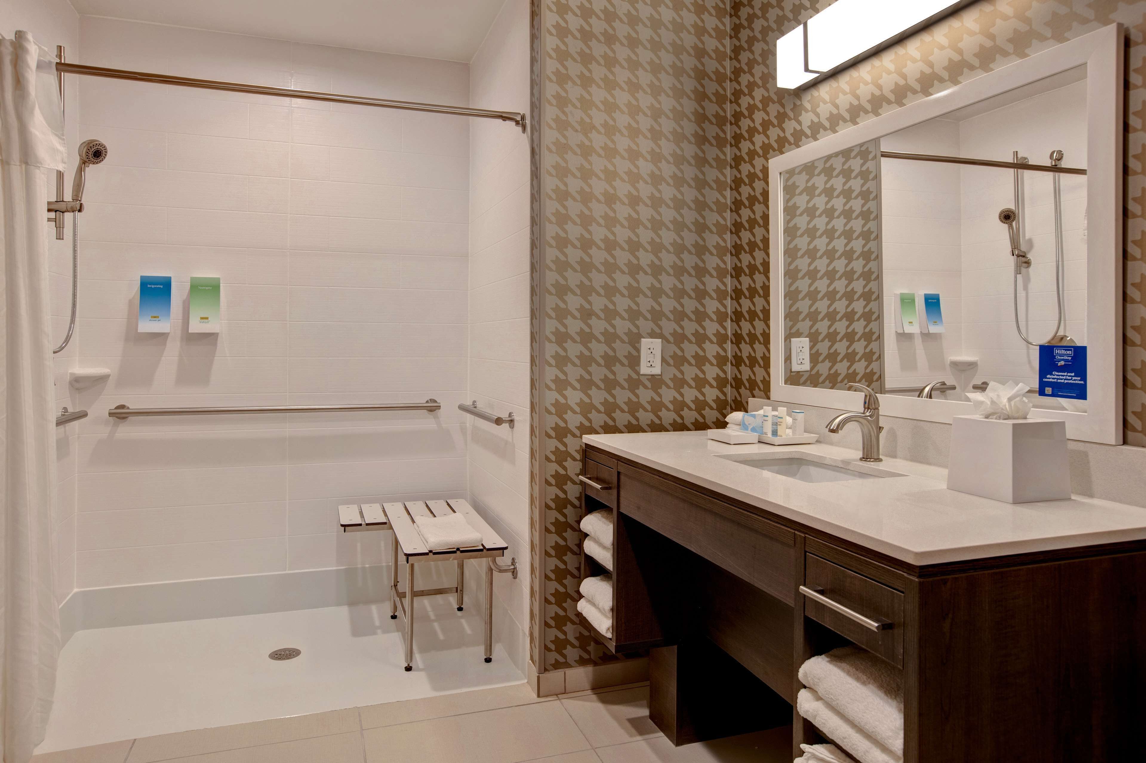 suite, 2 queen beds, accessible (roll-in shower) | bathroom | free toiletries, hair dryer, towels