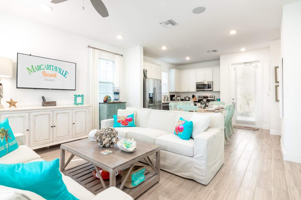 house, multiple beds, park view (deluxe-four bedroom) | living room | 55-inch tv with cable channels, streaming services