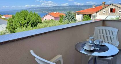 Holiday apartment with balcony and air conditioning