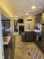 Family Suite | Private kitchen | Fridge, microwave, stovetop, coffee/tea maker