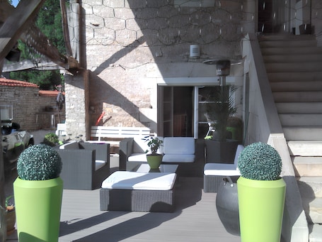 Terrace/patio. Homerez - Apartment in Chenevrey-et-Morogne