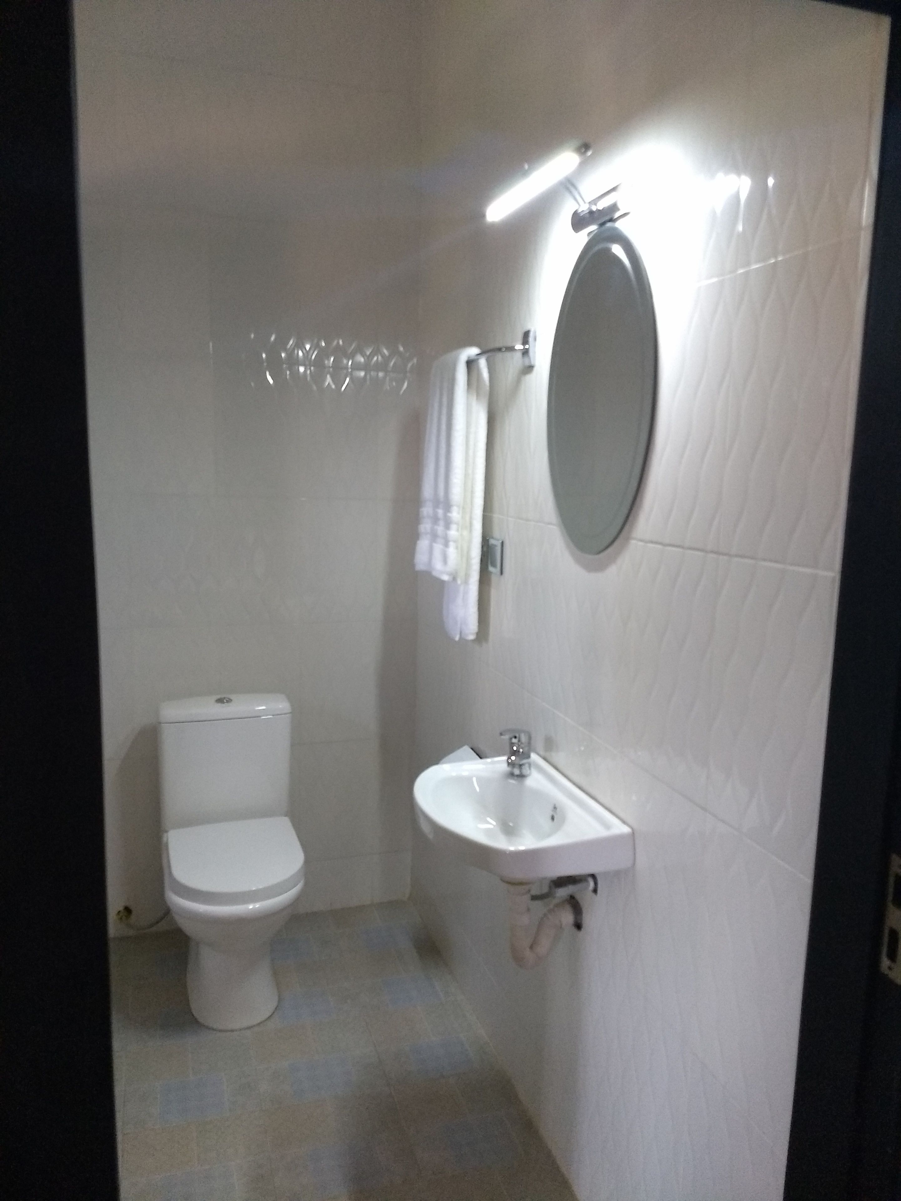 standard room | bathroom | shower, rainfall showerhead, free toiletries, slippers