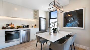 2 Bedroom Deluxe Apartment | Private kitchen | Full-size fridge, microwave, oven, stovetop