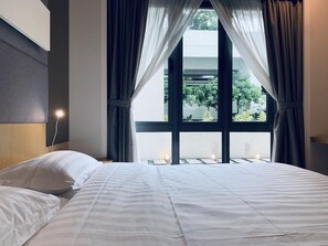 Two Bedroom Garden View #3 | Desk, blackout drapes, iron/ironing board, free WiFi - Utopian Homes at IMAGO Mall (Kota Kinabalu)