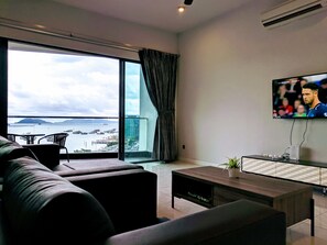 Four Bedroom Sea View | Living room | 37-inch LED TV with digital channels, TV - Utopian Homes at IMAGO Mall (Kota Kinabalu)