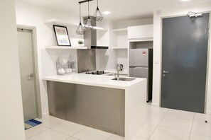 Two Bedroom Apartment #5 | Private kitchen | Full-size fridge, microwave, oven, stovetop - Utopian Homes at Sutera Avenue (Kota Kinabalu)