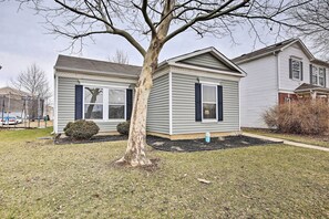 A two-story house with a front yard, a tree, and a small bush. - Patio Dining, 7 Mi to Purdue: Family Escape! (Lafayette)