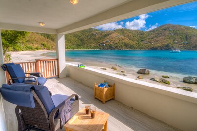 Unique beach front property steps away from the beautiful waters of brewers bay.