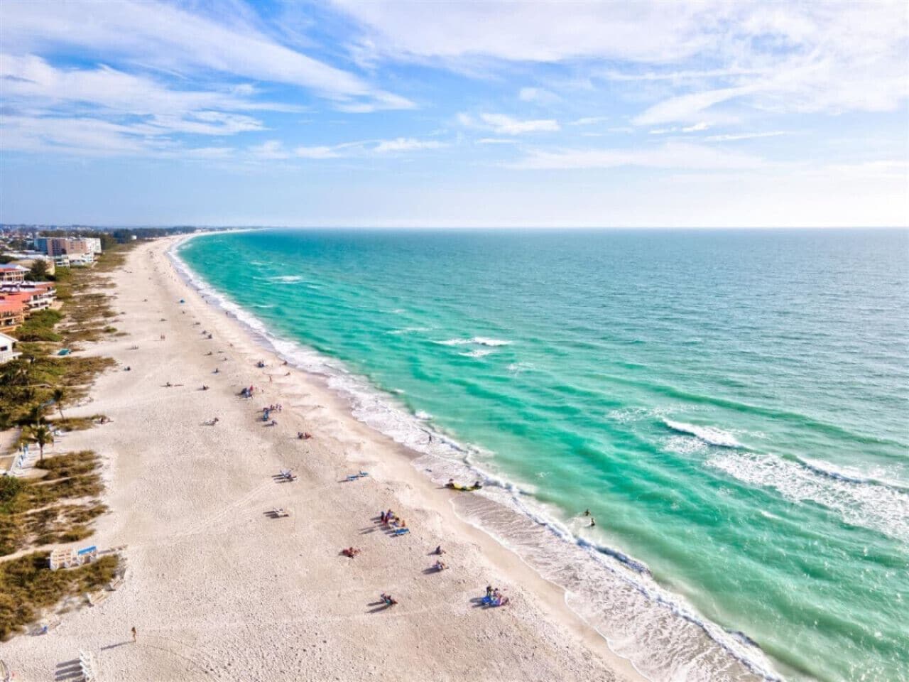 On the beach, sun loungers, beach towels