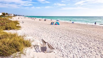 On the beach, sun loungers, beach towels