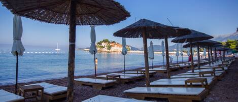 On the beach, beach towels