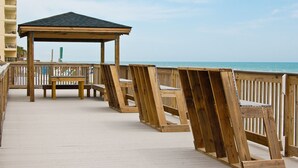 A wooden deck with benches and a gazebo overlooking the ocean. - Sea Oaks Oceanfront 2-Bed / 2-Bath (Garden City)
