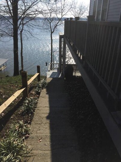Dock on lake and our 750 sq ft cottage home at Kentucky Lake