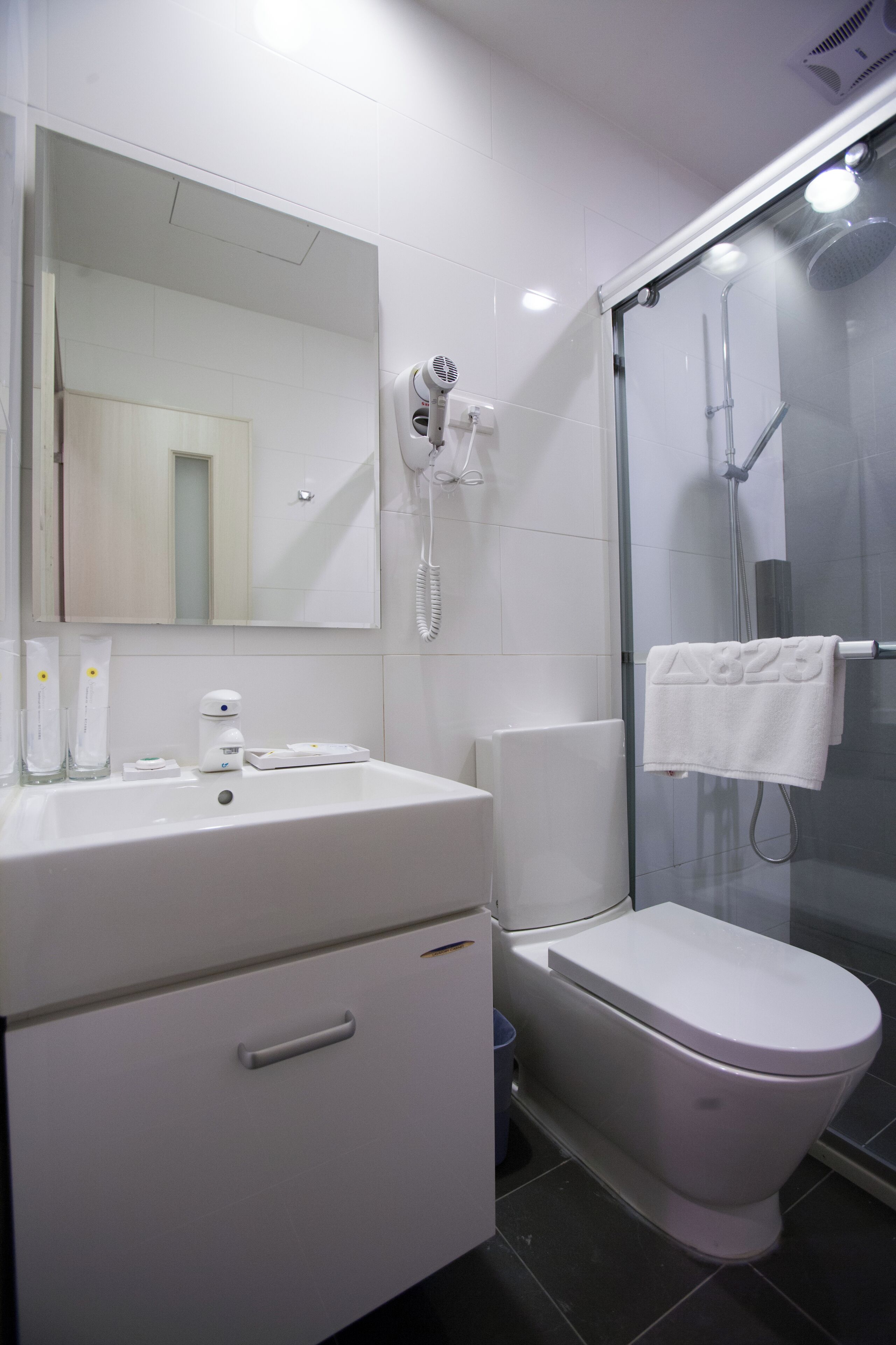 free toiletries, hair dryer, slippers, towels